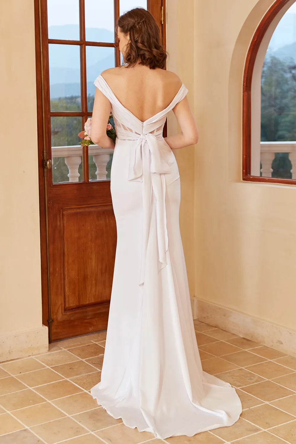 Off shoulder white backless and floor length fishtail wedding dress