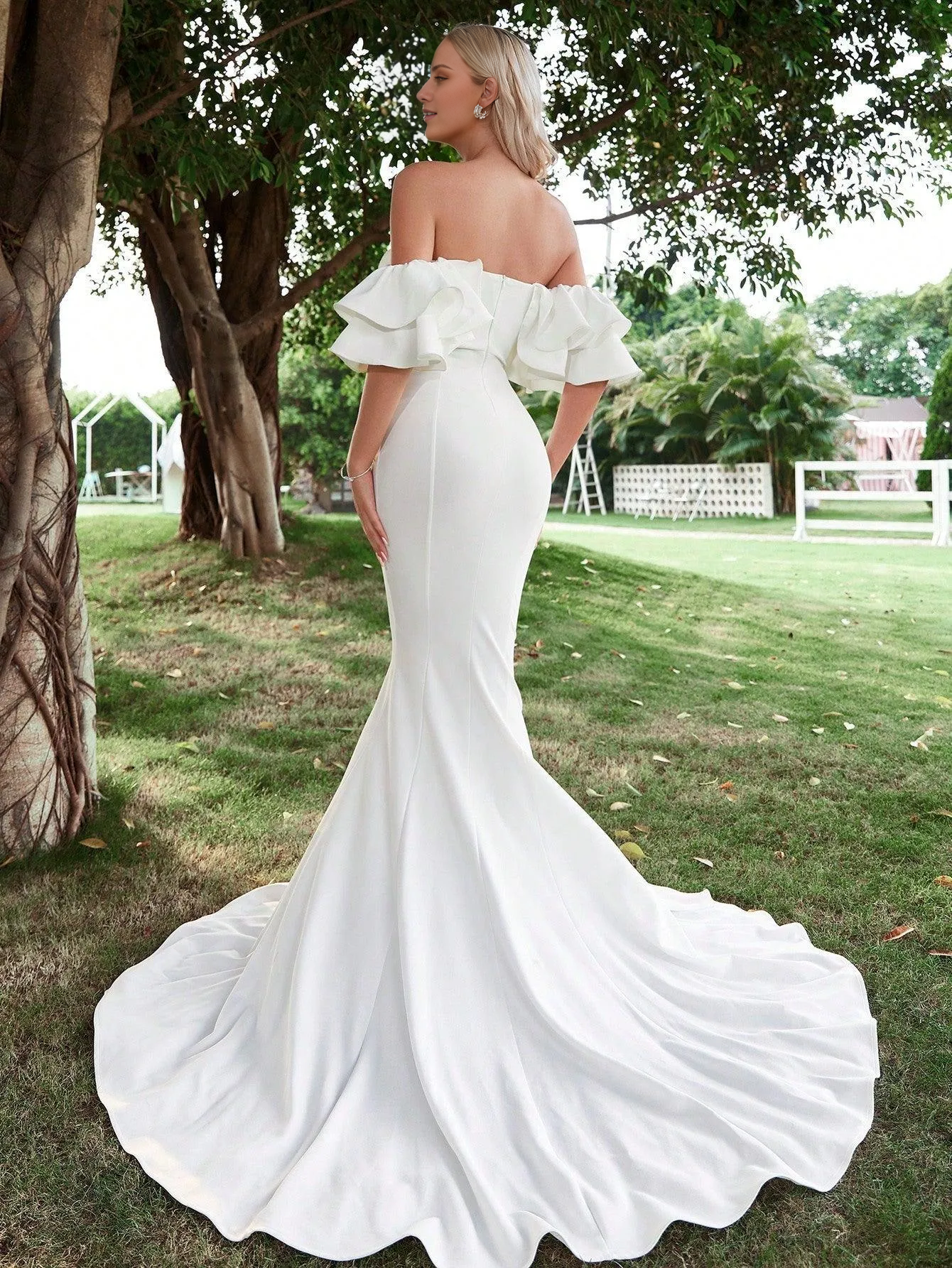 Off shoulder ruffle edge and floor length wedding dress