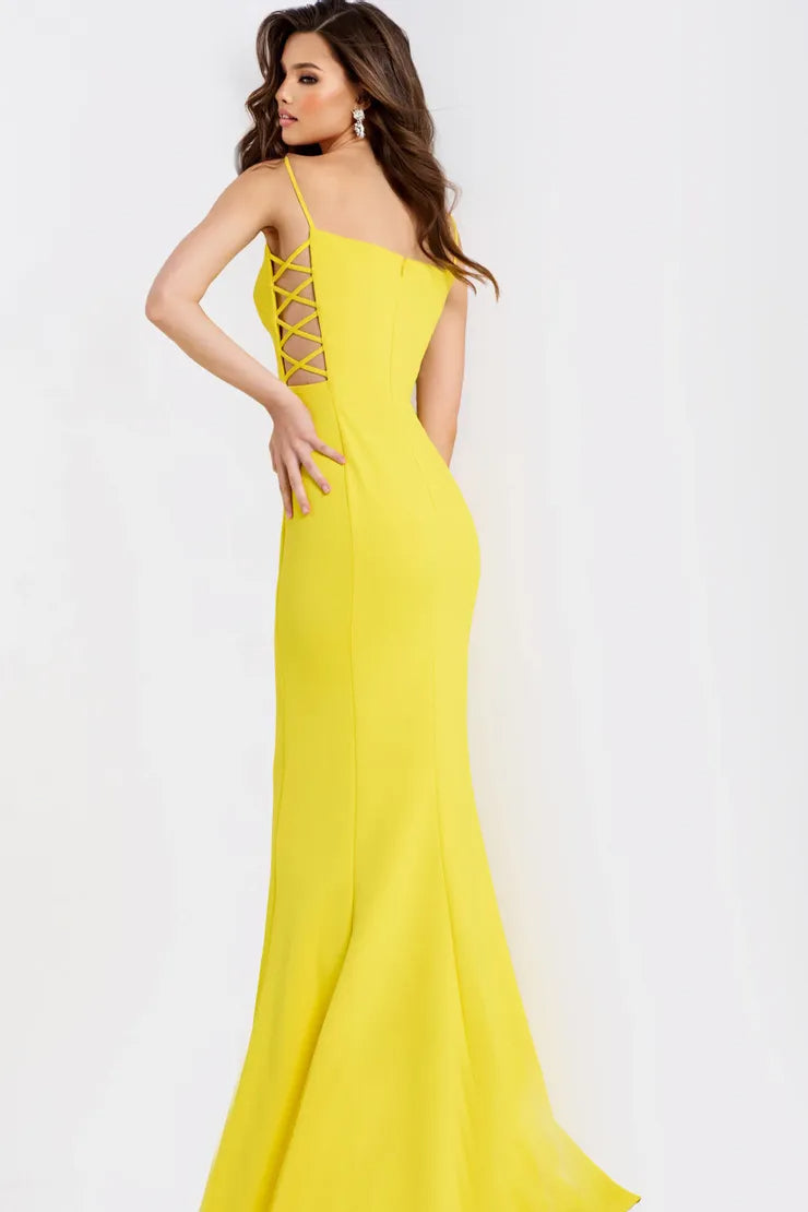 Bold yellow crepe evening dress with spaghetti straps, square neck, lace-up side cut-outs, and mermaid skirt with train
