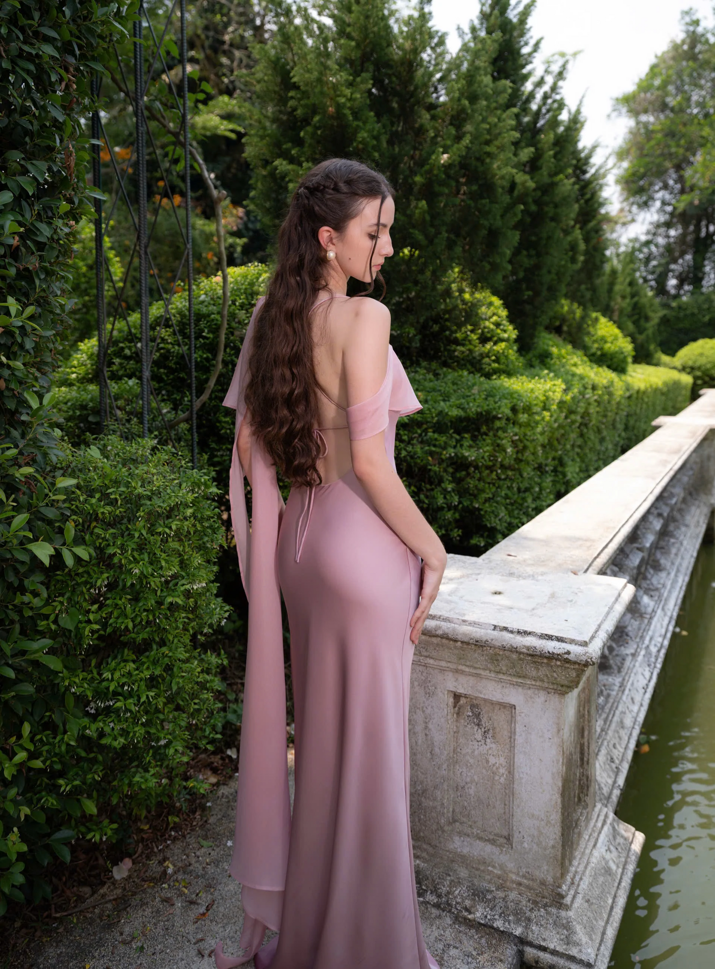 Form-fitting mermaid one-shoulder ruffled overlay floor-length evening dress