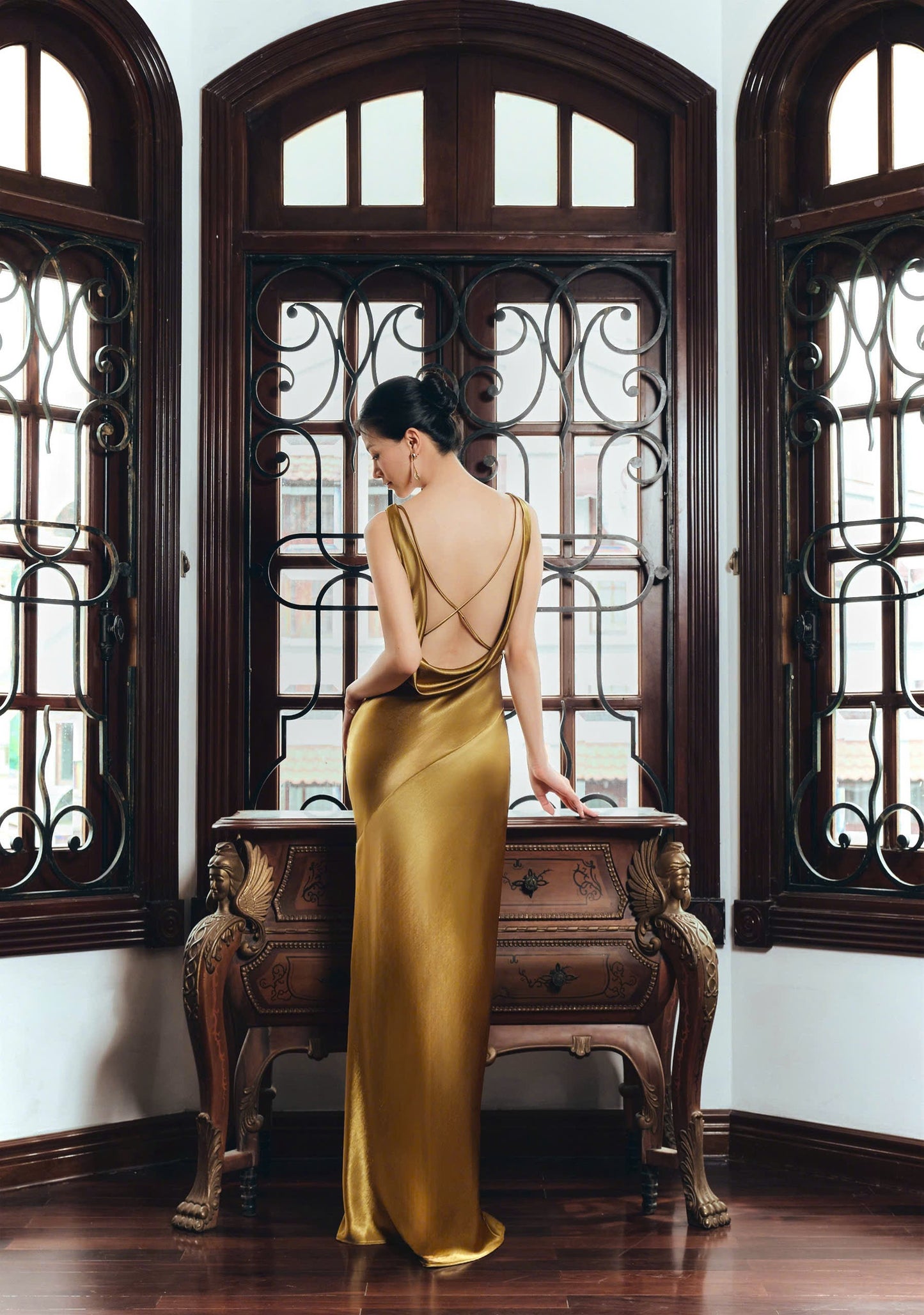 Form-fitting slip cowl neck sleeveless open-back floor-length evening dress