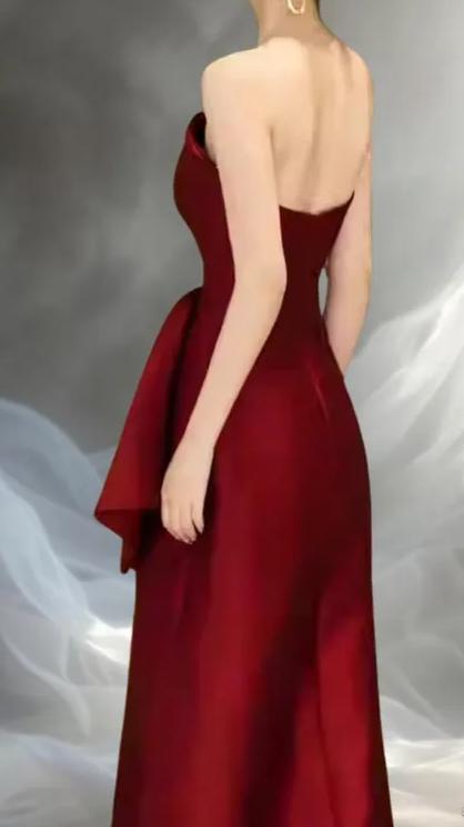 Regal Burgundy Satin Evening Dresses with Strapless Neckline, Floral Bow Detail, Asymmetrical Ruffle Skirt and Floor-Length A-Line Silhouette Formal Gown