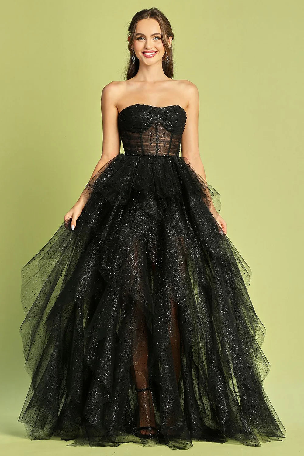 Whimsical strapless glitter tulle evening dress with corset bodice, layered ruffle skirt and lace-up back