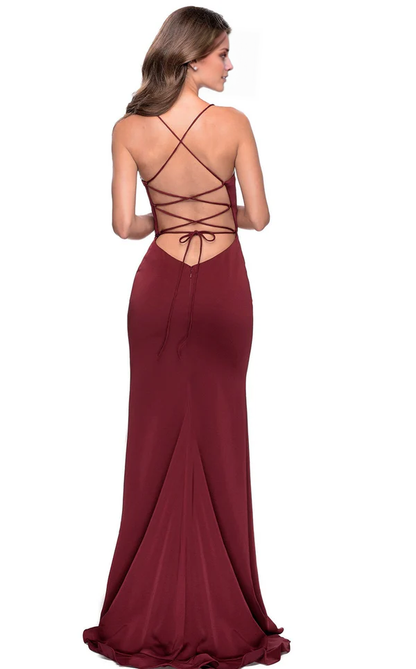Spoon neckline thin shoulder straps ruffled edges and floor length evening gown