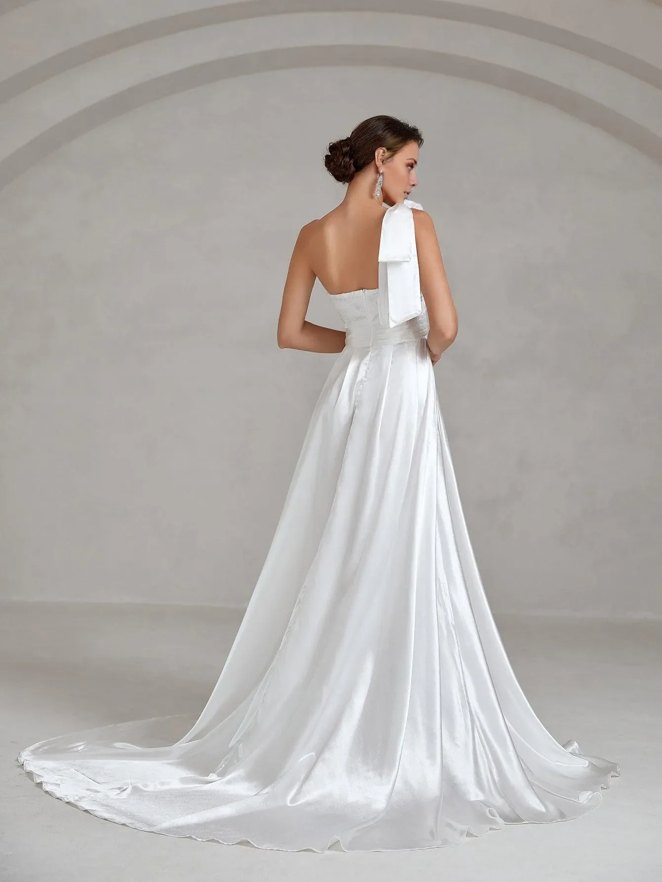 One shoulder bow satin and floor length wedding dress