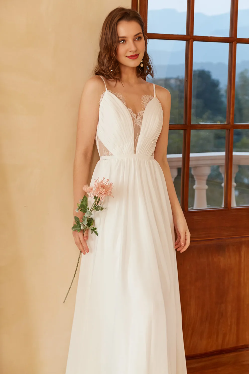 White thin shoulder strap minimalist wedding dress