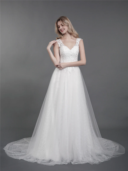 Lace wedding dress with drag and shoulder straps