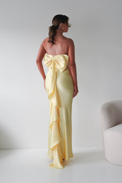 Bright Yellow Strapless Mermaid Prom Dress with Dramatic Back Bow
