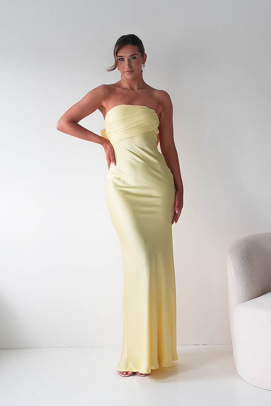 Bright Yellow Strapless Mermaid Prom Dress with Dramatic Back Bow