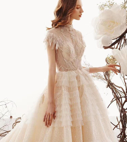 Champagne A-line High Neck Cap Sleeve Beaded Ruffle Tiered Cathedral Train Wedding Dress