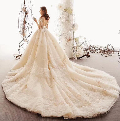 Champagne A-line High Neck Cap Sleeve Beaded Ruffle Tiered Cathedral Train Wedding Dress