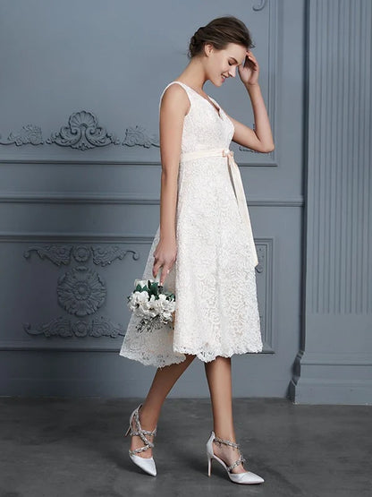 Elegant Lace A-Line V-Neck V-Back Tea-Length Bridal Gown