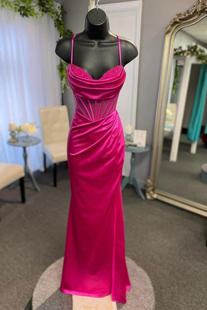 Back view of beaded satin mermaid dress showing lace-up detail.