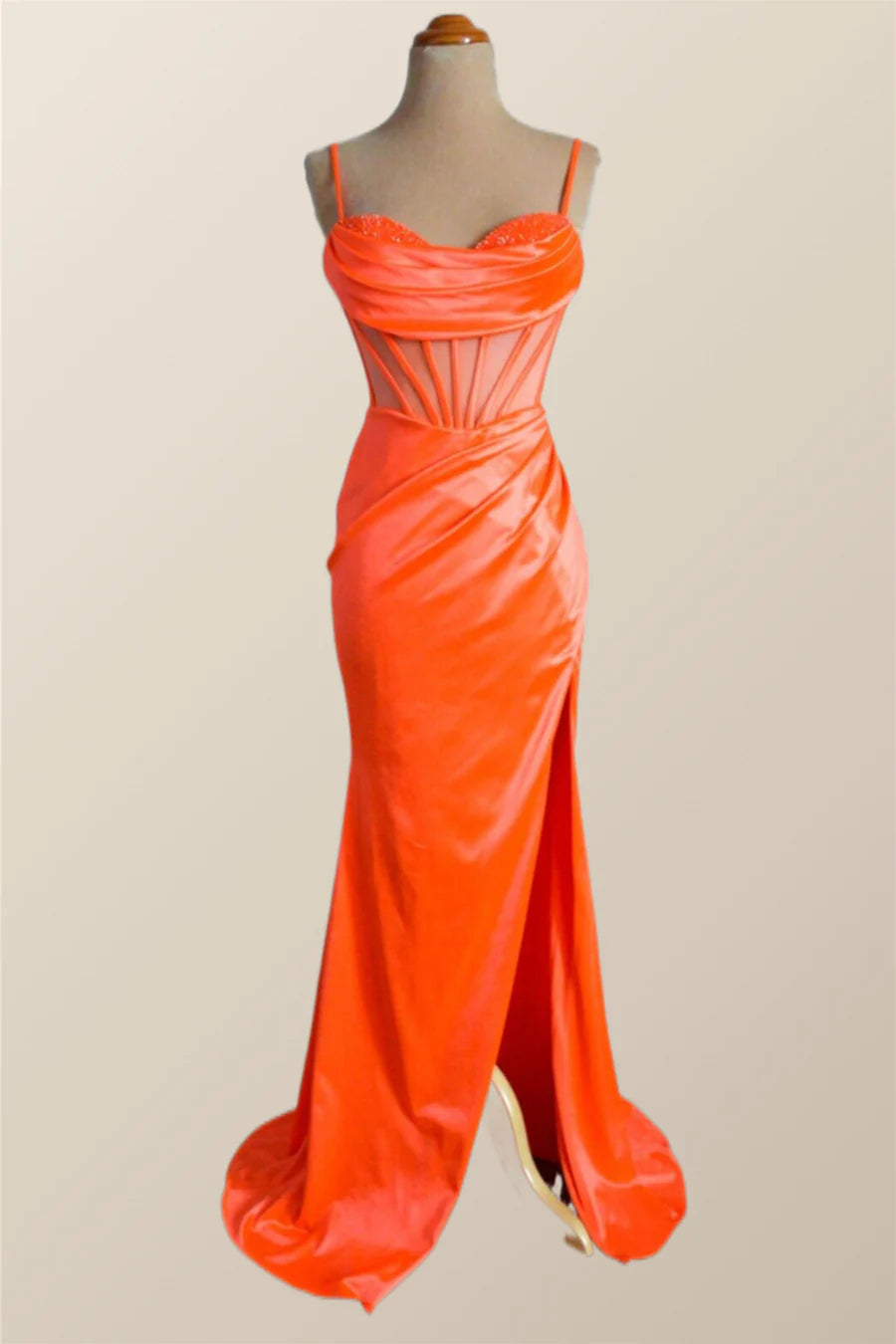 Full length view of elegant satin mermaid gown for formal events.