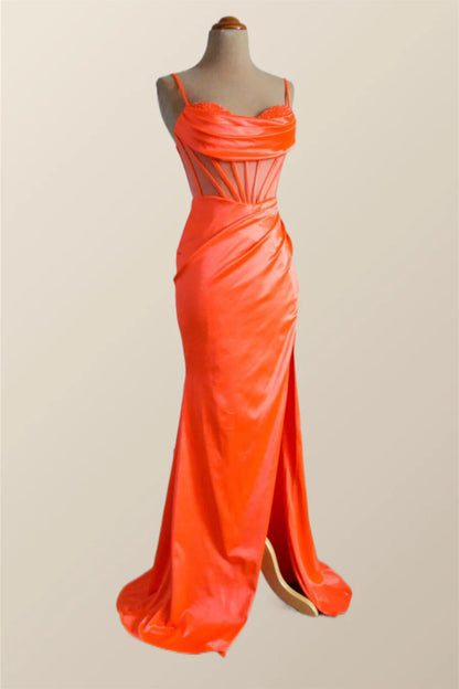 Detail of ruched satin skirt and high slit on evening gown.