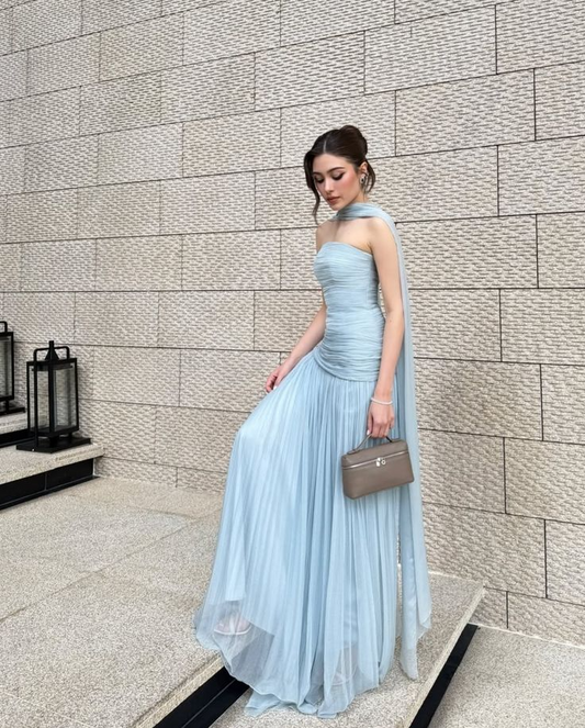 Elegant chiffon A-line prom dress with strapless ruched bodice and draped shawl.