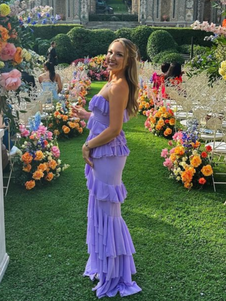 Side view of the lavender chiffon mermaid prom dress, highlighting the cascading ruffle details.