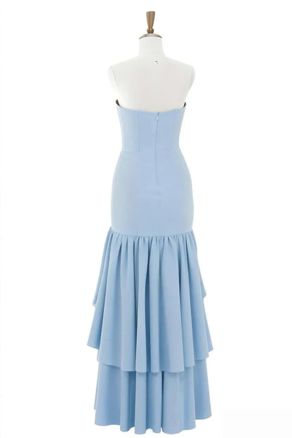 Close-up of the high-low ruffle detailing on the crepe prom dress.