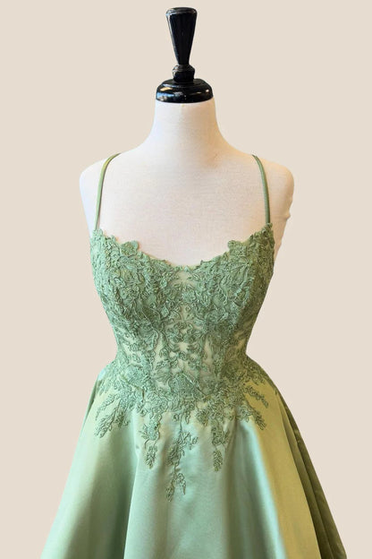 Close-up of the lace-up back on a satin A-line formal gown.