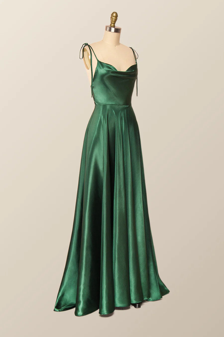 Back view of an elegant satin A-line evening gown with V-back and subtle train.