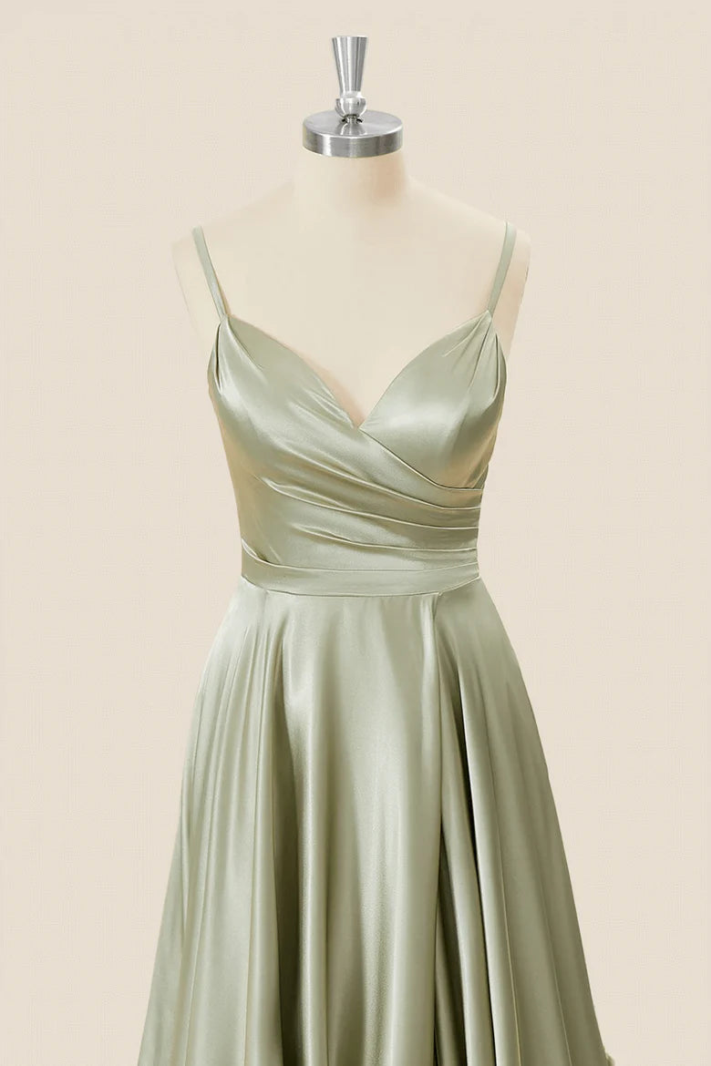Side view of elegant satin A-line dress, showing flowing skirt.
