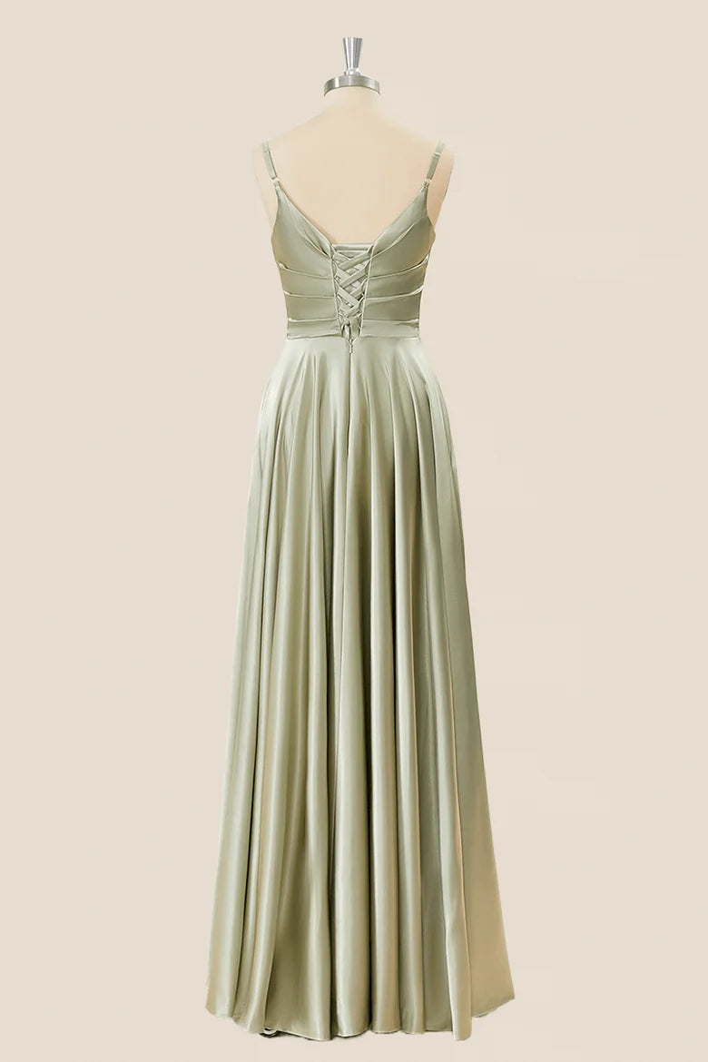 Front view of sweetheart neckline and ruched bodice on satin dress.