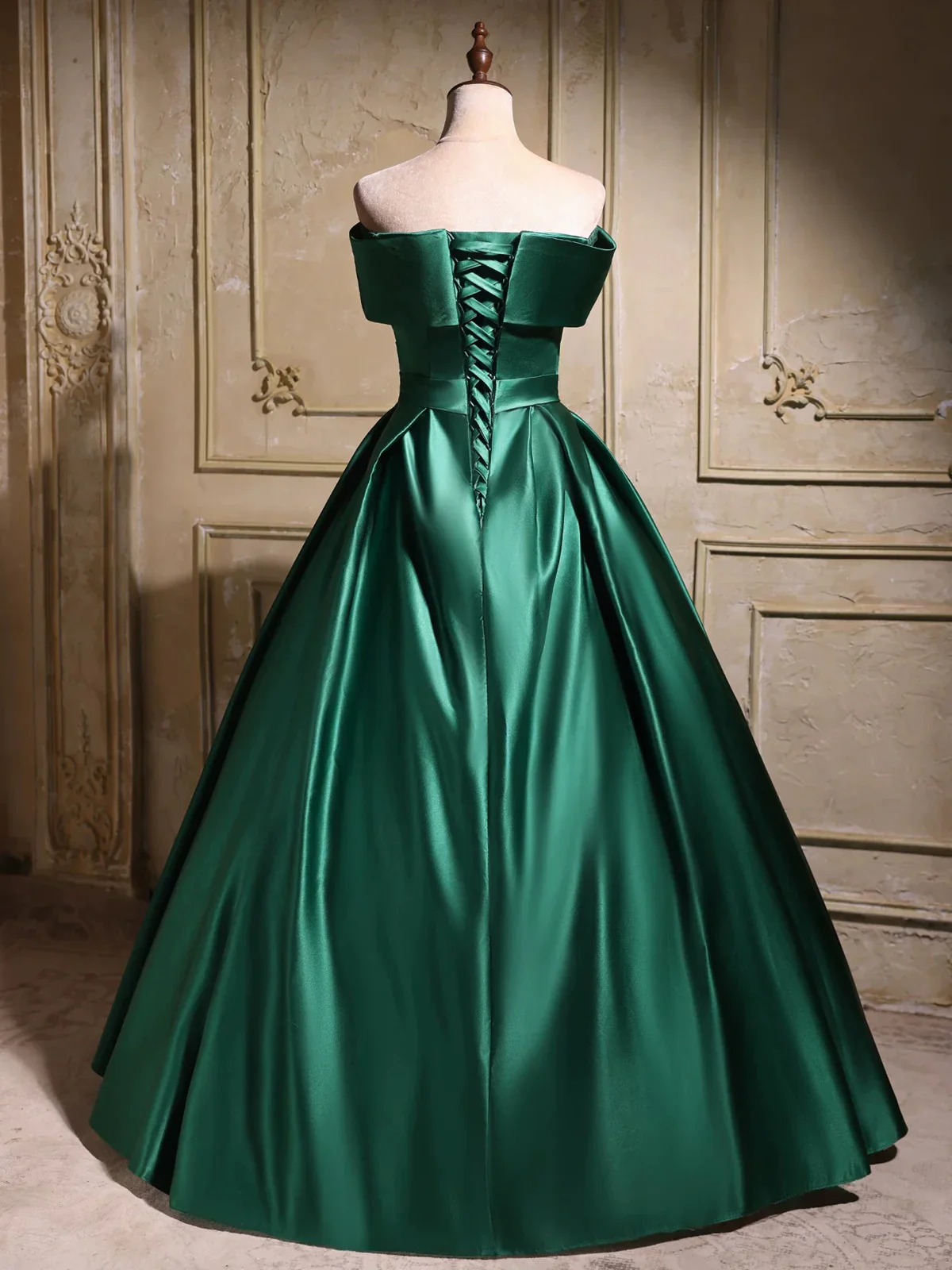 Front view of voluminous floor-length satin prom dress.
