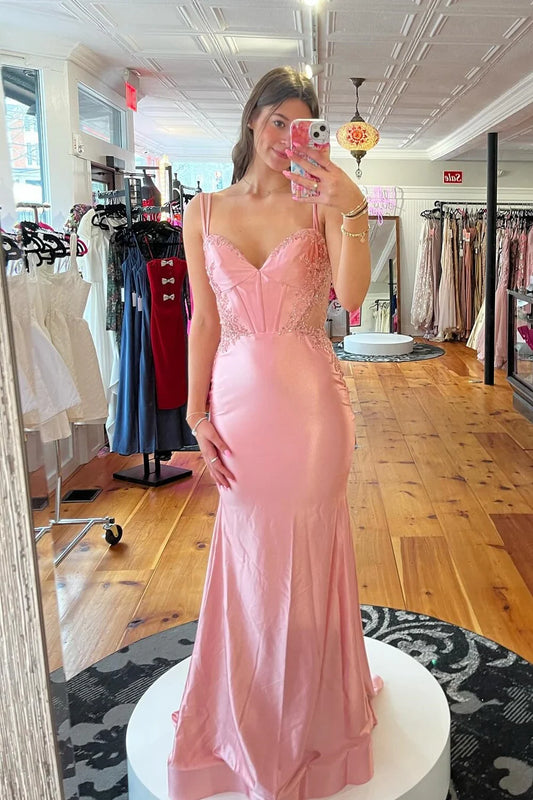 Elegant satin mermaid evening dress with lace appliqués and sweetheart corset bodice.