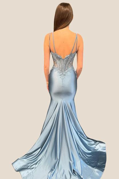 Side view of elegant mermaid gown, highlighting the flowing satin train.