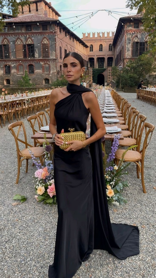 Elegant satin mermaid prom dress with one-shoulder cape and open back.