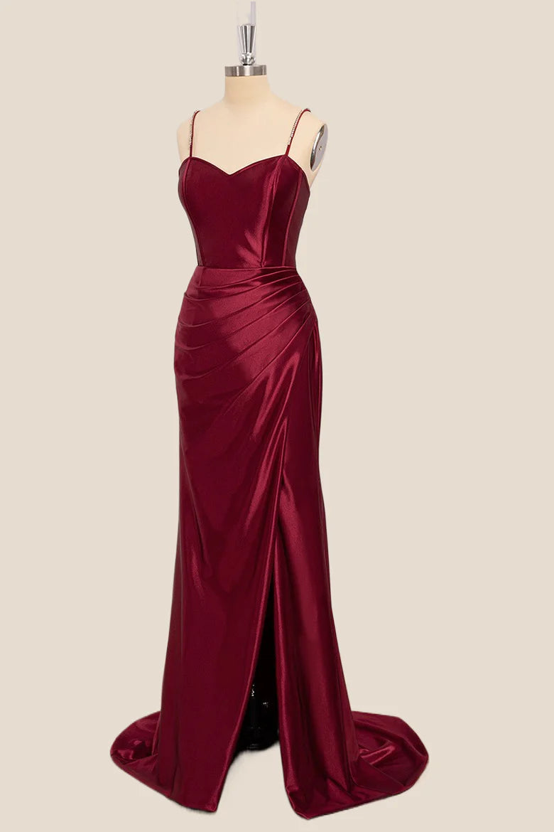 Model showcasing the high slit and train of the satin mermaid dress.