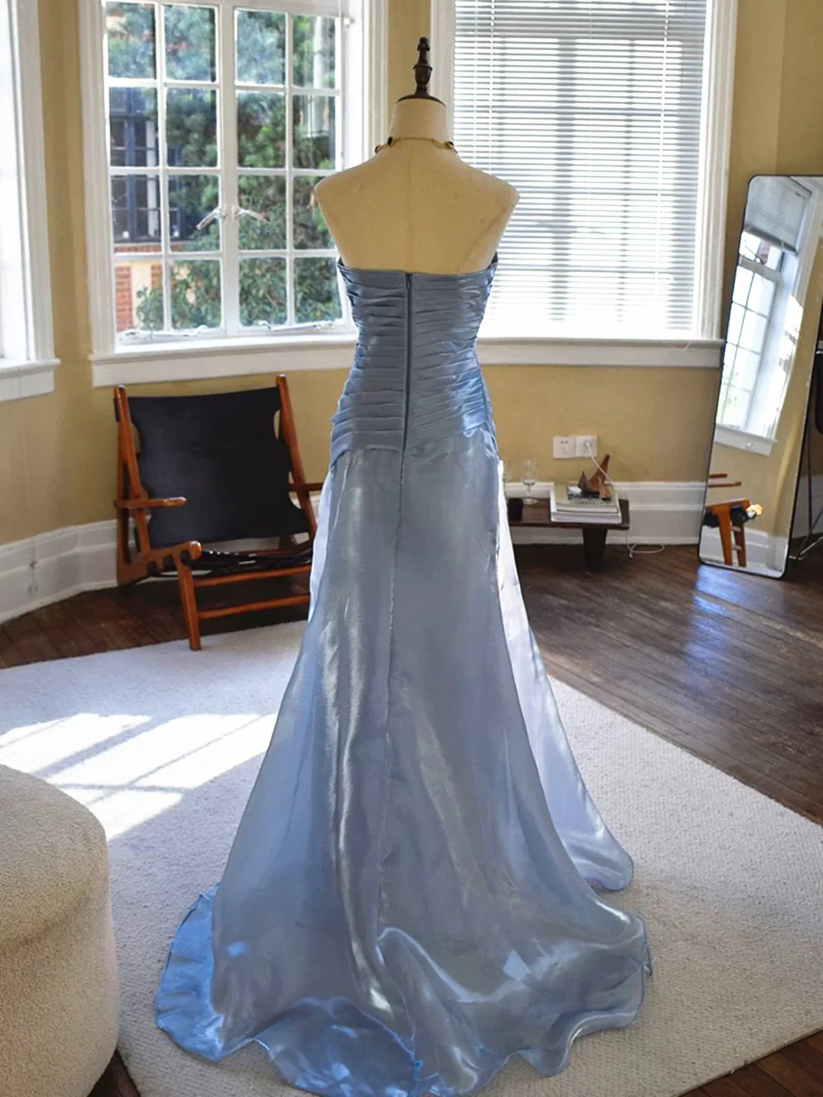 Front view of the elegant strapless shimmer organza dress.