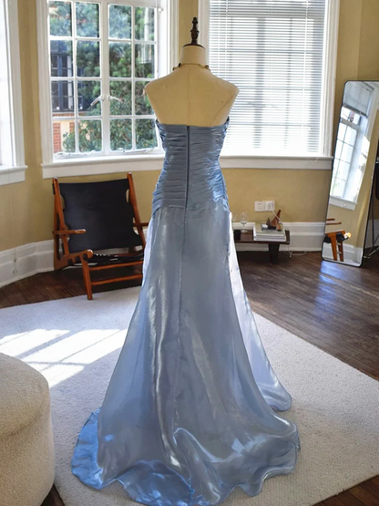 Front view of the elegant strapless shimmer organza dress.