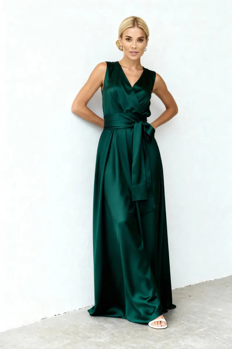 Elegant Emerald Green Satin Evening Dresses with Sleeveless V-Neck, Self-Tie Belt, Open Back and Flowing Maxi Silhouette Formal Gown