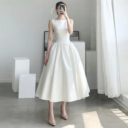 Elegant A-Line Boat-Neck Sleeveless Backless Bow Ivory Midi Evening Dresses Women Gown