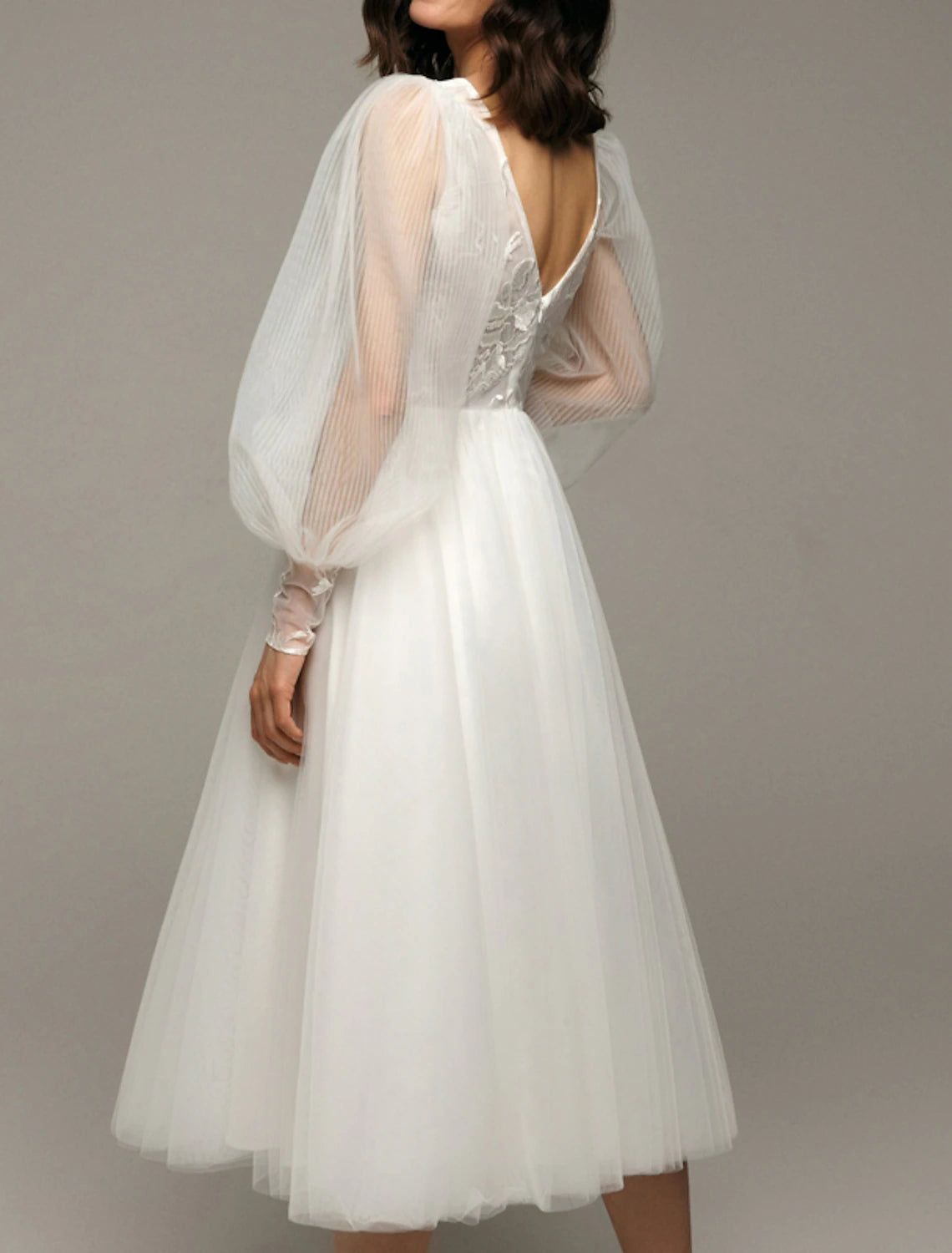 Ethereal white lace tulle Aline deep Vneck puff long sleeve Vback midi length wedding dress