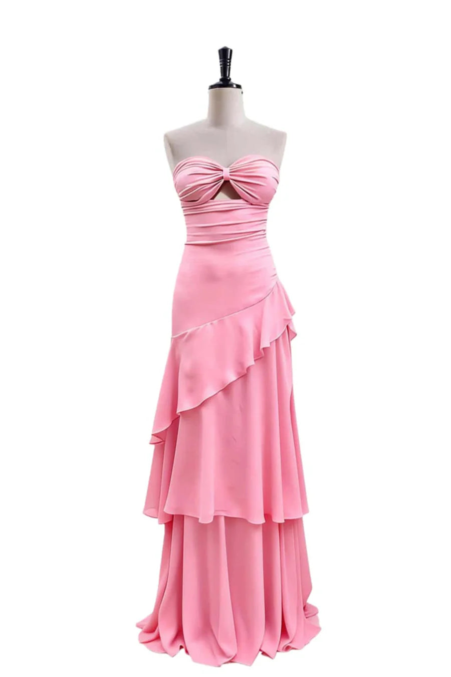 Close-up of the strapless keyhole-twist neckline on the evening dress.
