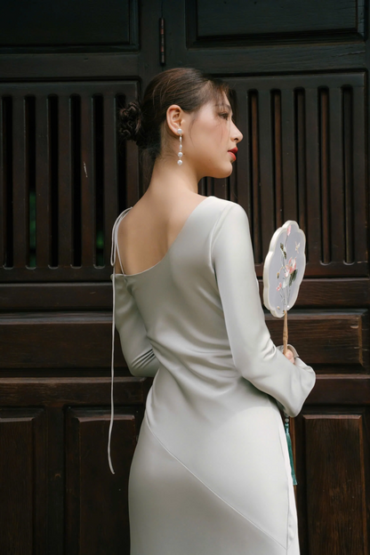 Form-fitting mermaid one-shoulder long-sleeve floor-length evening dress