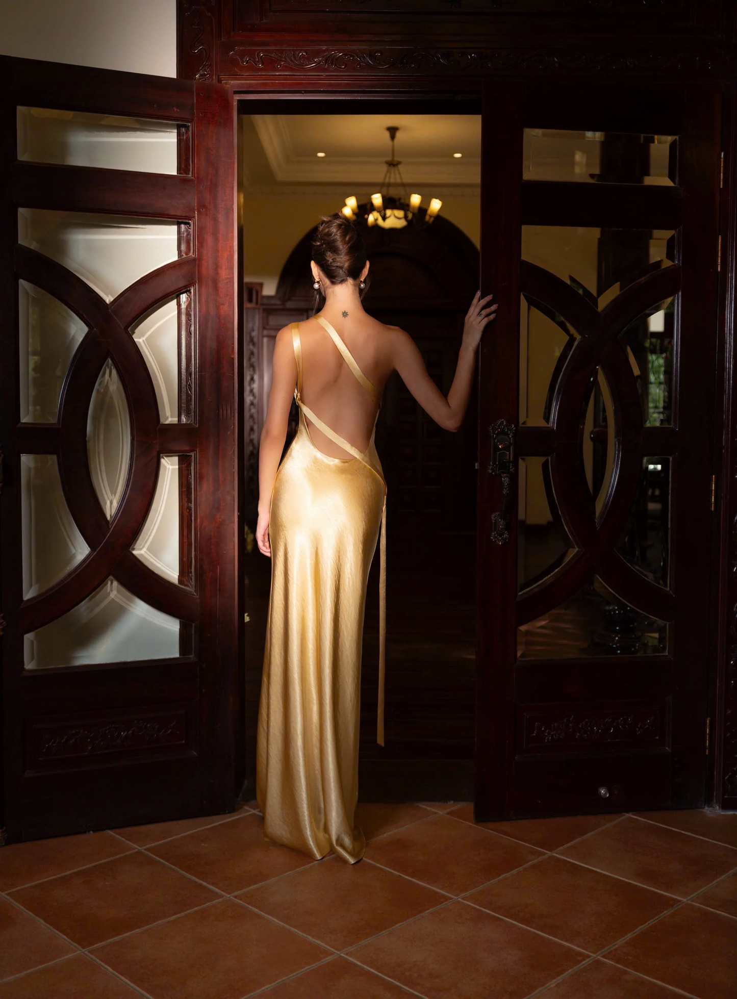 Form-fitting mermaid one-shoulder open-back floor-length evening dress
