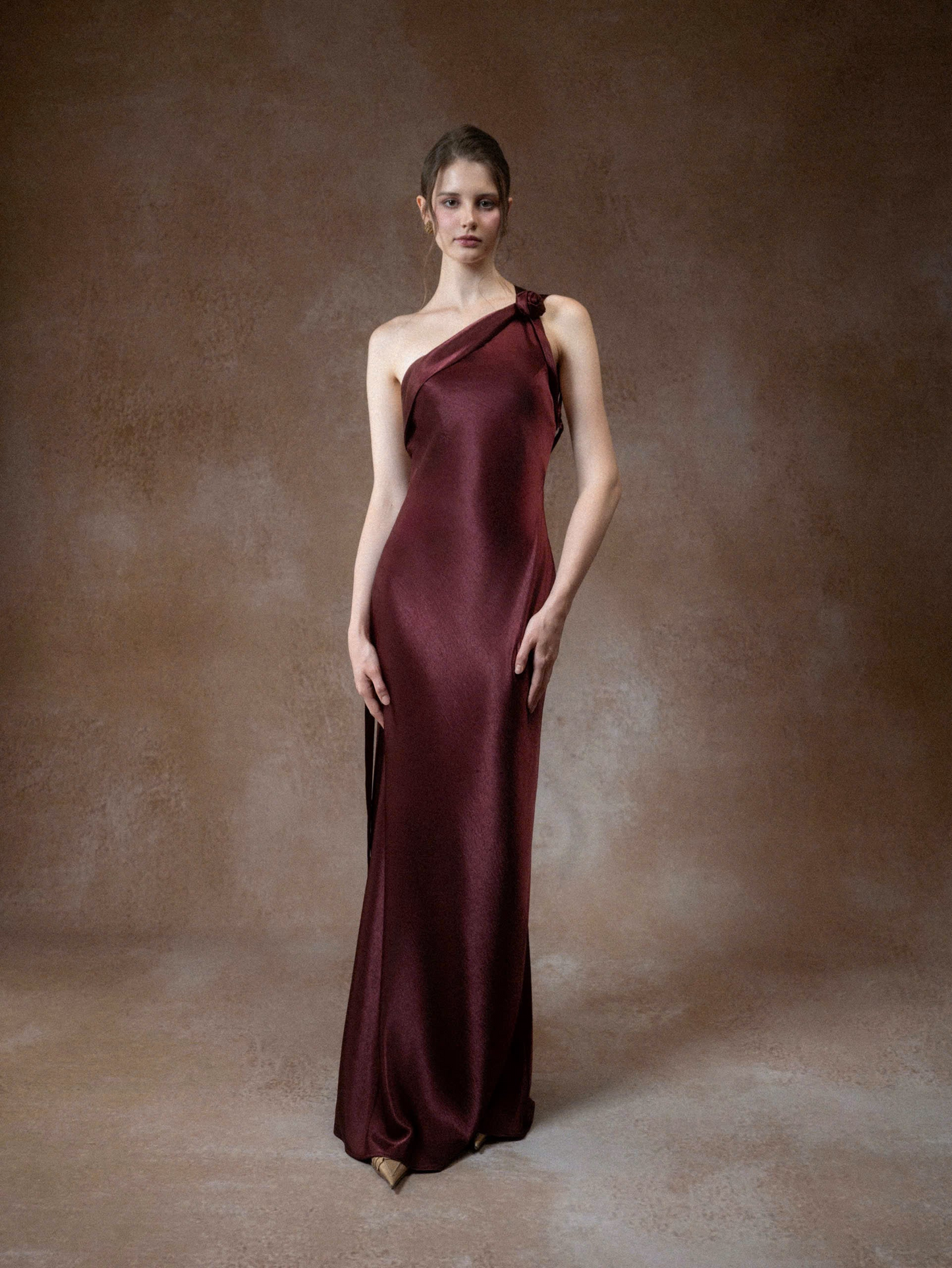 Form-fitting mermaid one-shoulder open-back floor-length evening dress