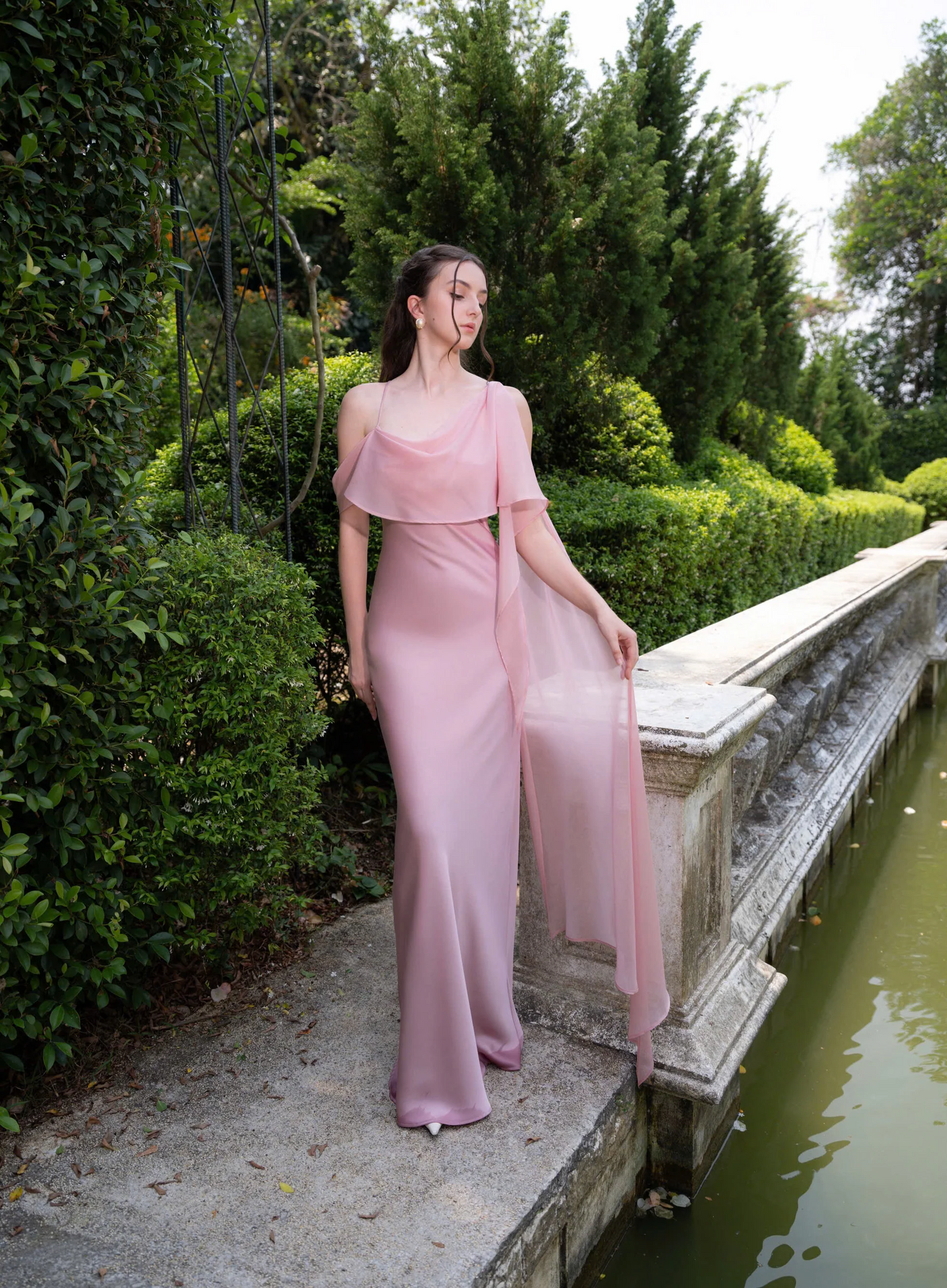 Form-fitting mermaid one-shoulder ruffled overlay floor-length evening dress
