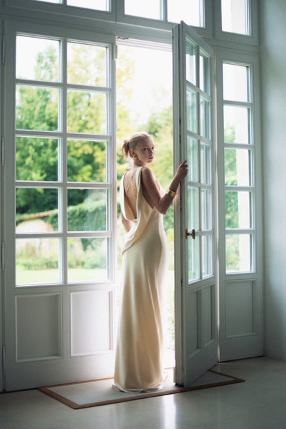 Form-fitting slip cowl neck sleeveless open-back floor-length evening dress