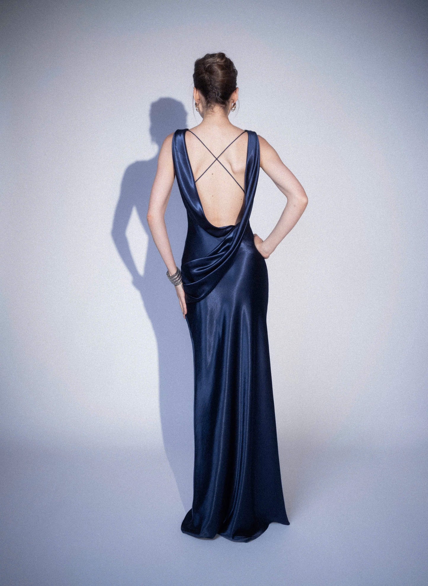 Form-fitting slip cowl neck sleeveless open-back floor-length evening dress