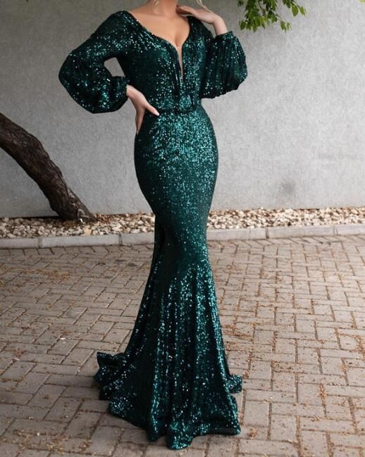 Glamorous sequin mermaid prom dress with V-neck and bishop sleeves.