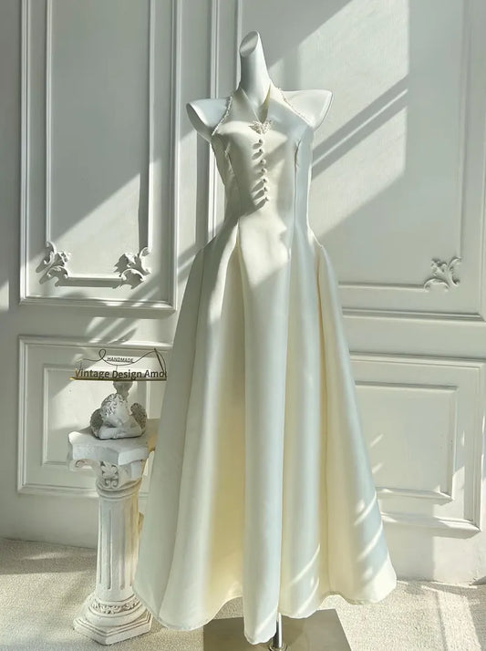 Halter Neck Satin Evening Dress with Beaded Trim, Button Detail and Full Skirt