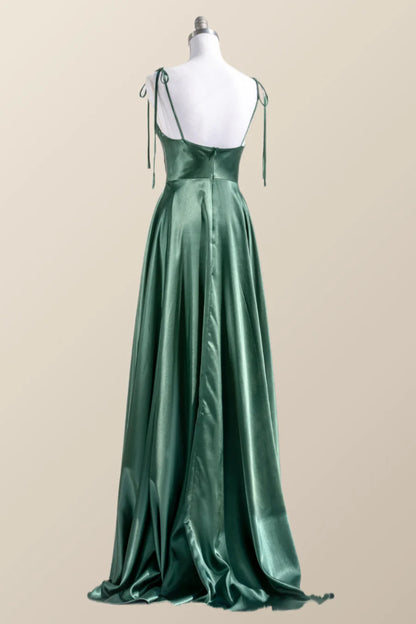 Front view of a lustrous satin A-line gown with cowl neck detail.