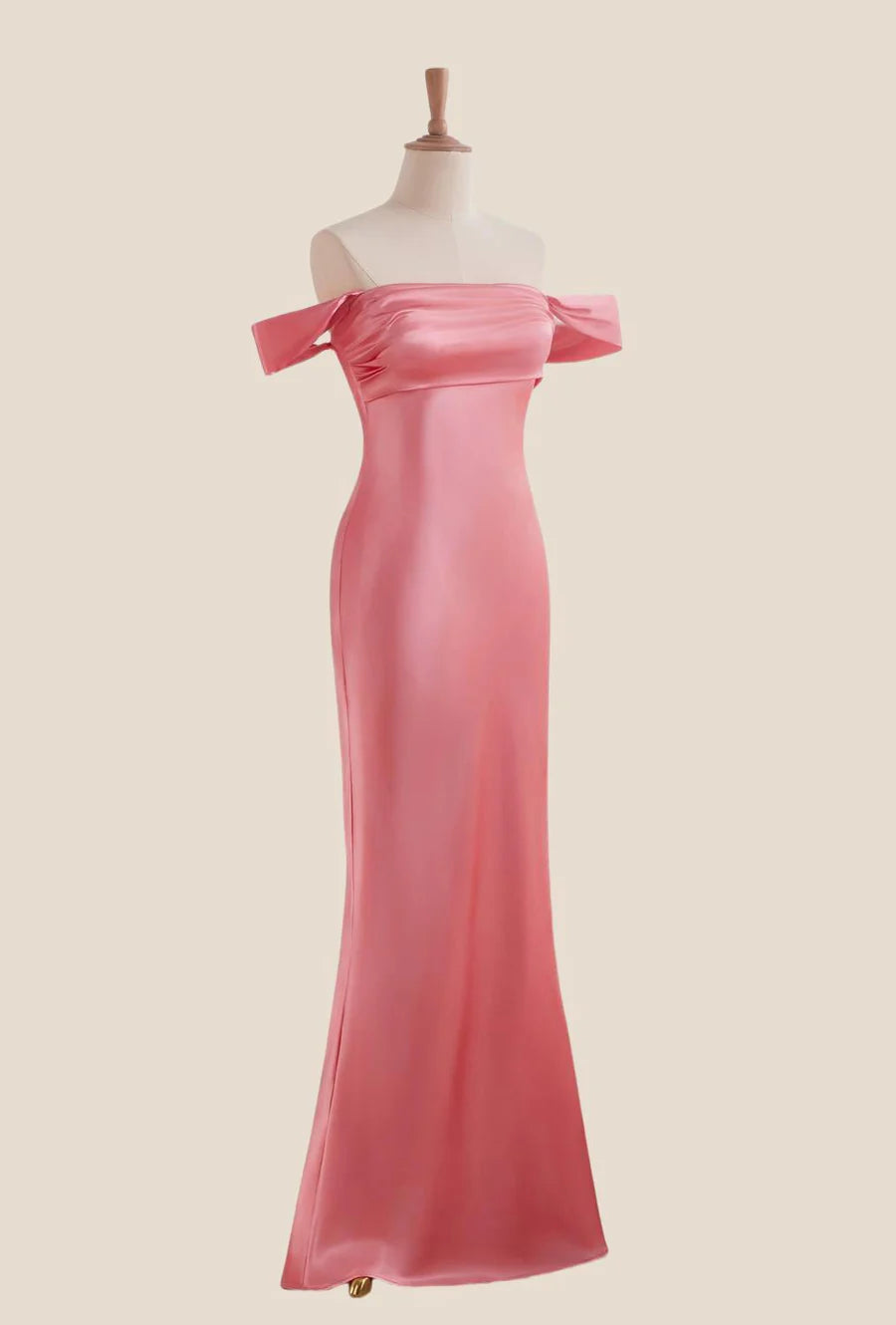Side view of the satin mermaid gown, highlighting its elegant drape and subtle train.