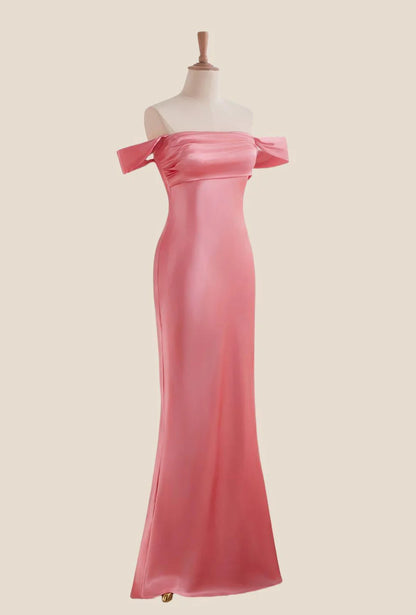Side view of the satin mermaid gown, highlighting its elegant drape and subtle train.