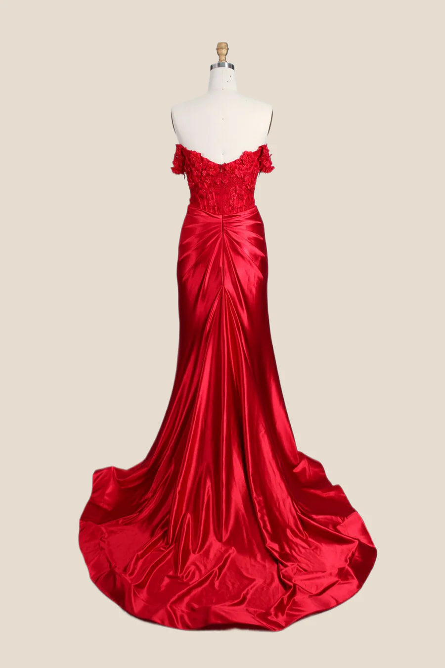 Side view of the lustrous satin mermaid evening dress, highlighting the off-shoulder neckline and elegant silhouette.
