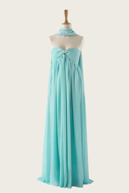 Full-length view of a model posing in an elegant satin mermaid evening dress.